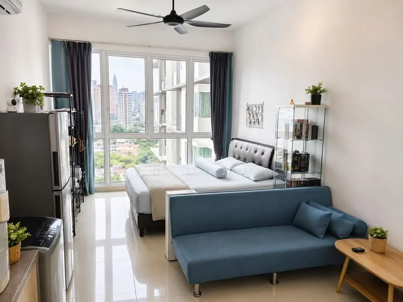 Bedroom features: king-size bed, upholstered headboard, floor-to-ceiling windows, city view, 3-blade ceiling fan, white painted walls, glossy tile flooring, blue fabric sofa, wooden coffee table, glass display cabinet, refrigerator, decorative plants; style: modern; view: city.