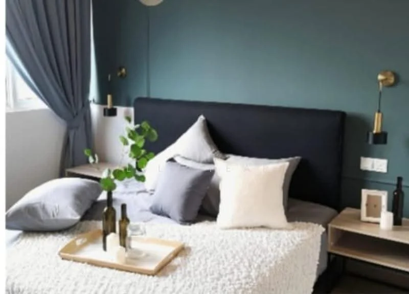 Bedroom features: king-size bed with upholstered headboard, grey bedding with decorative pillows, white textured throw blanket, two bedside tables, wall-mounted reading lights, blue accent wall, curtains in light blue, decorative vase with greenery, glass water tumbler, wooden tray on bed; style: modern.