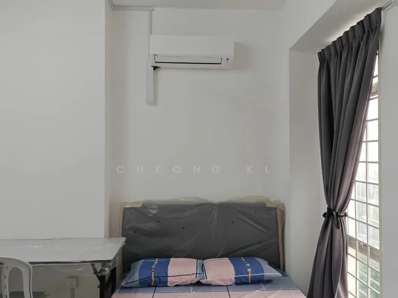 Bedroom features: queen-size bed with blue and pink bedding, 1 wall-mounted split AC, grey curtains, white walls, table with white surface, chair with metal frame, floor-to-ceiling window, city view; style: modern; view: city.