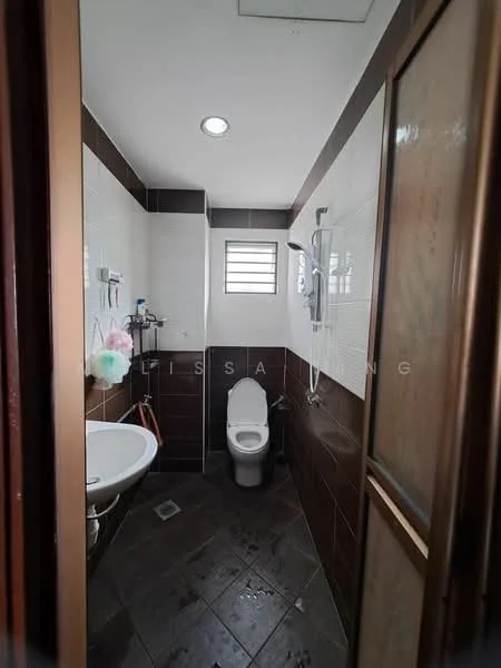 Bathroom features: white tiled walls, dark brown tiled walls, dark grey tile flooring, single-sink vanity with round basin, chrome basin mixer faucet, one-piece toilet, handheld shower, wall-mounted shower head, window for natural light, recessed ceiling lights, mirror above vanity; style: modern.