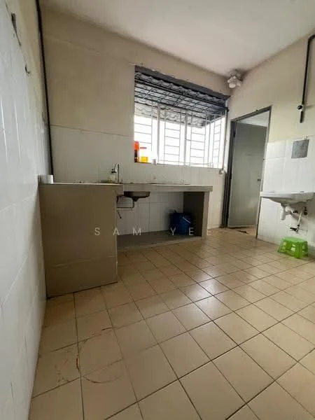 Laundry features: white tiled walls, beige tiled flooring, single-bowl stainless-steel sink, countertop with storage underneath, window with metal grilles, door leading to another room, wall-mounted faucet, green plastic stool.