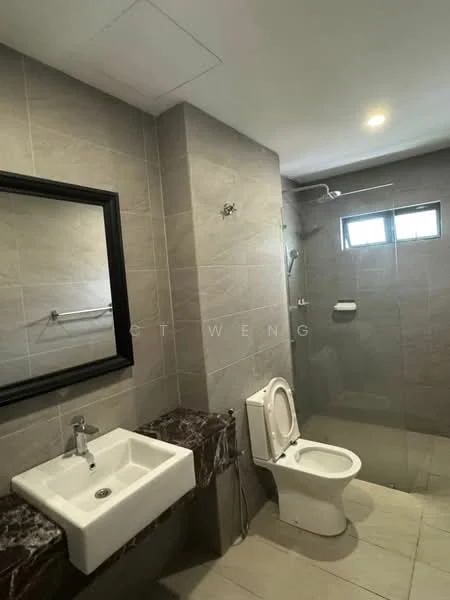 Bathroom features: grey tiled walls, grey tiled flooring, single-bowl ceramic sink, chrome basin mixer faucet, black framed mirror, one-piece toilet, walk-in shower with glass partition, shower head, window for natural light, wall-mounted towel bar, light fixture on ceiling; style: modern.