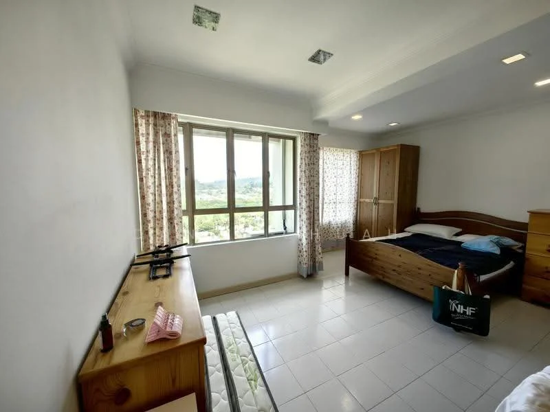 Bedroom features: white painted walls, tile flooring, large window with view, curtains with floral pattern, wooden bed frame, mattress on bed, wooden wardrobe, wooden dresser, nightstand, decorative items on dresser; view: garden.