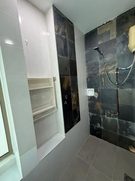 Bathroom features: shower area with wall-mounted shower head, built-in shower niche, black stone wall cladding, white ceramic wall tiles, grey floor tiles, water heater mounted on wall, toilet flush panel, drainage grate on floor; style: modern.