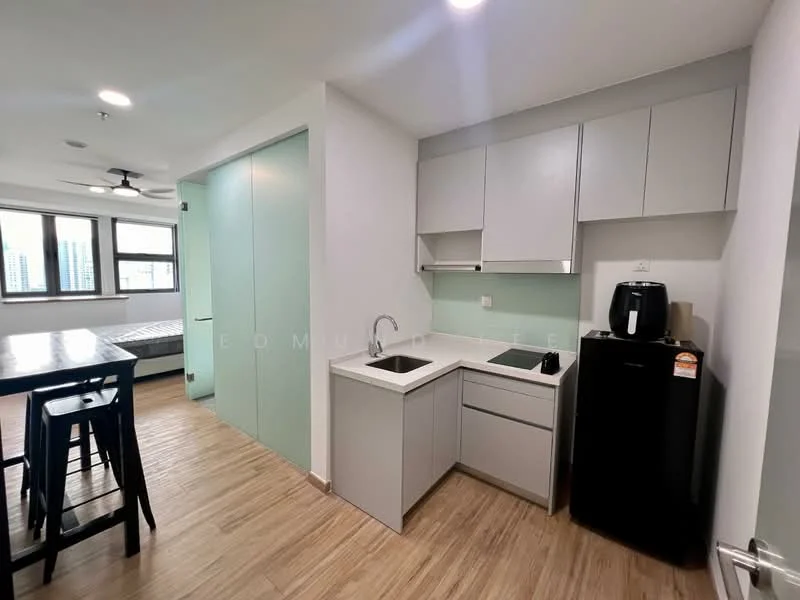 Kitchen features: white cabinetry, light green backsplash, single-bowl stainless-steel sink, chrome pull-down faucet, built-in stove, countertop with overhang, black refrigerator, wooden flooring, recessed downlights, floor-to-ceiling windows, open layout to living area; style: modern; view: city. Room features: dining table with high stools, ceiling fan, bed visible in background, wooden flooring.