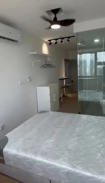 Bedroom features: queen-size bed, 5-blade ceiling fan, wall-mounted split AC, glass partition, built-in wardrobe, wooden flooring, track lighting, white painted walls, window with city view, hanging clothes rack, small dining table, chair; style: modern; view: city.