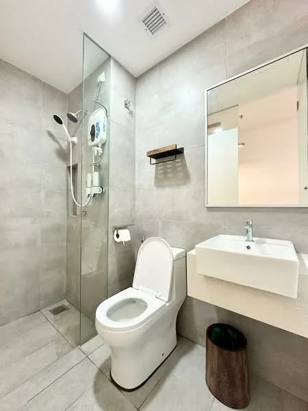 Bathroom features: walk-in shower with glass enclosure, rain shower head, handheld shower, white ceramic toilet, single-sink vanity with square basin, chrome basin mixer faucet, mirror above sink, wall-mounted towel rack, grey tile walls, light grey tile flooring; style: modern.