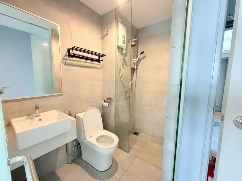 Bathroom features: white ceramic toilet, single-sink vanity with wall-mounted cabinet, chrome basin mixer faucet, framed mirror, glass shower enclosure, rain shower head, handheld shower, grey tiled walls, light grey floor tiles, towel rack, toilet paper holder; style: modern.