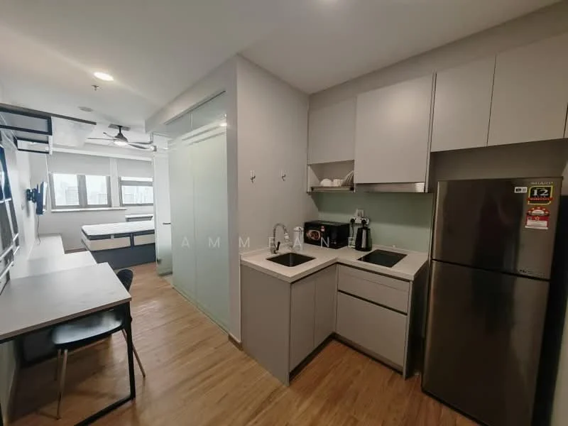 Kitchen features: single-bowl stainless-steel sink, chrome pull-down faucet, grey cabinetry, built-in refrigerator, white countertop, ceramic tile backsplash, microwave, kitchen island, wooden flooring, recessed downlights; style: modern. Room features: bed with bedding, wall-mounted TV, study desk, ceiling fan, large windows.