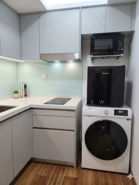 Kitchen features: grey flat-panel cabinets, white quartz countertop, single-bowl stainless-steel sink, chrome pull-down faucet, built-in microwave, freestanding black fridge, front-load washing machine, ceramic tile backsplash, induction cooktop, under-cabinet lighting, wood laminate flooring, skylight for natural light; style: modern.