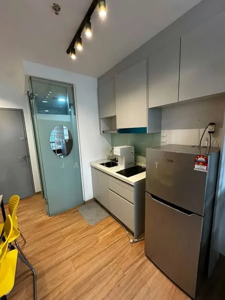Kitchen features: grey cabinetry, white countertop, stainless-steel fridge, built-in stove, microwave, glass splashback, wooden laminate flooring, track lighting, glass door, round mirror on door; style: modern.