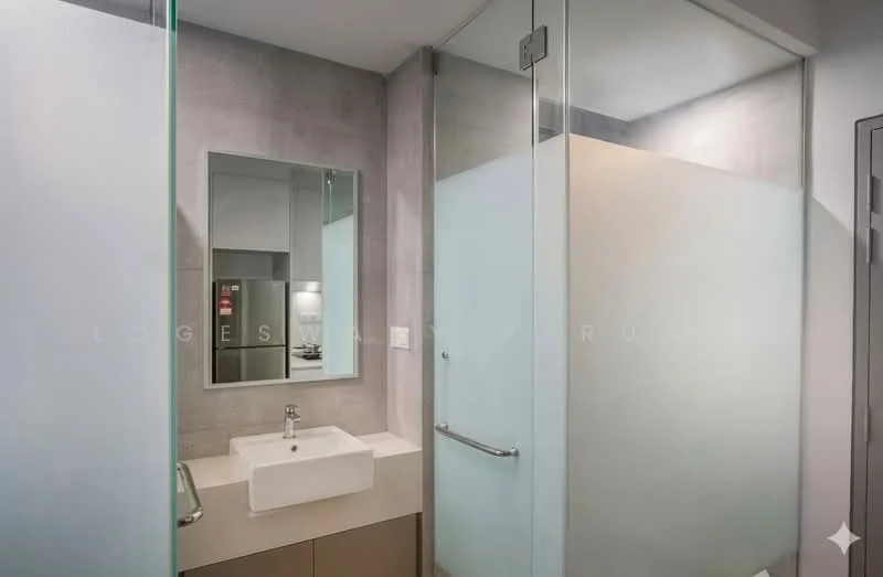 Bathroom features: glass shower enclosure, wall-mounted sink, chrome basin mixer faucet, framed mirror, grey tiled walls, light grey flooring, built-in cabinetry, recessed lighting; style: modern.