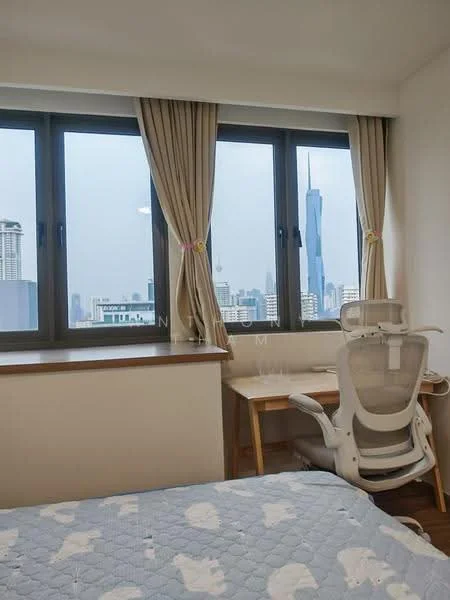 Bedroom features: floor-to-ceiling windows, curtains, wooden flooring, queen-size bed with light bedding, study desk, ergonomic office chair, wall-mounted decor, city skyline view; style: modern; view: city.