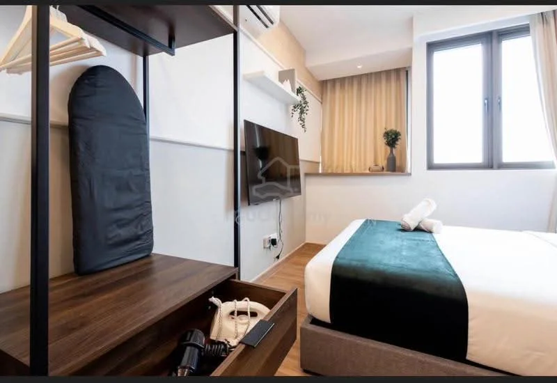Bedroom features: queen-size bed with white bedding, wooden flooring, wall-mounted TV, black iron clothing rack, ironing board, built-in shelf with decorative plant, curtains, air conditioning unit, nightstand, drawer storage, towels, light-colored walls, window with city view; style: modern; view: city.