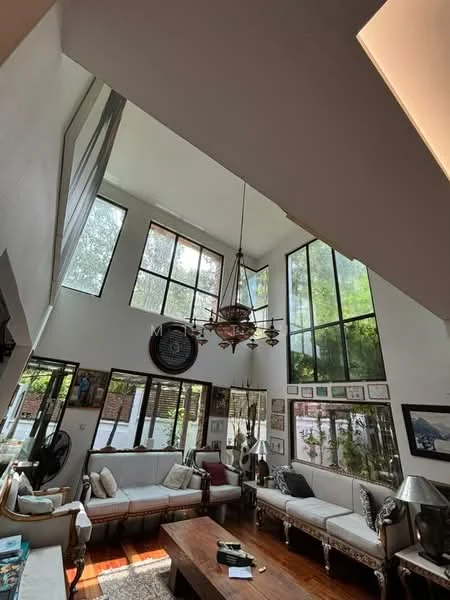 Living features: high ceiling, large floor-to-ceiling windows, wooden flooring, chandelier, white walls, decorative wall art, sofa with upholstery, wooden coffee table, potted plants, wall-mounted frames, natural light, open layout; style: contemporary; view: garden.