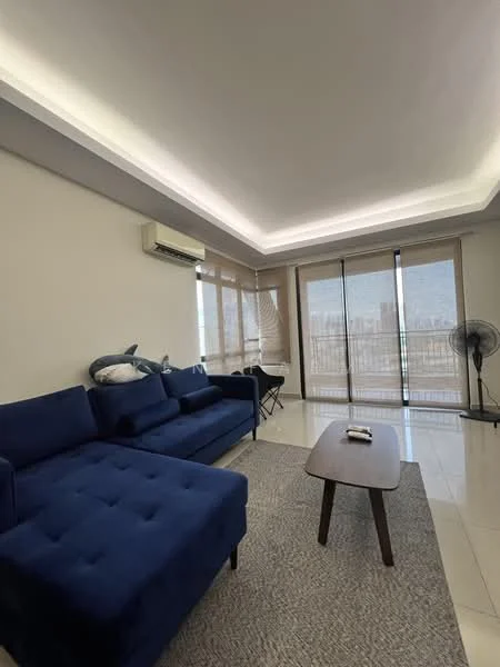 Living features: blue fabric sectional sofa, coffee table, area rug, floor-to-ceiling windows, sheer roller blinds, wall-mounted split AC, recessed LED downlights, ceiling with cove lighting, tile flooring, fan, decorative throw pillows; style: modern; view: city.