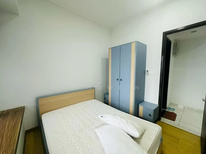 Bedroom features: queen-size bed, light wood bed frame, mattress, built-in wardrobe with grey and blue finish, nightstand with blue finish, wooden flooring, white painted walls, ceiling light, doorway leading to bathroom, decorative pillows; style: modern.