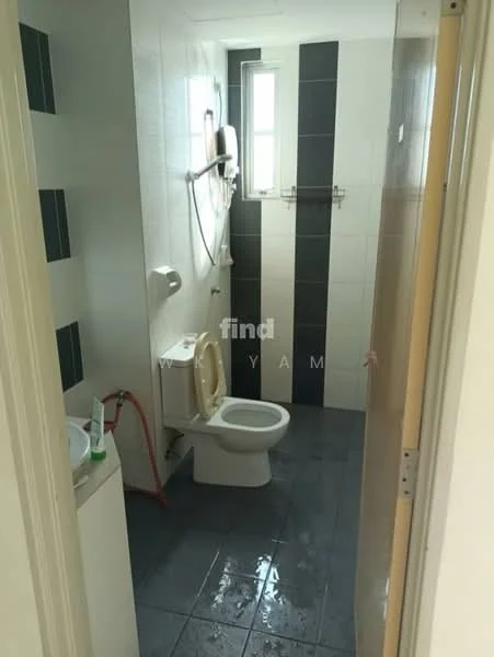 Bathroom features: white tiled walls, dark grey tiled flooring, one-piece toilet, wall-mounted shower head, handheld shower, shower curtain, small window for ventilation, sink with cabinet, toilet paper holder, towel rack.