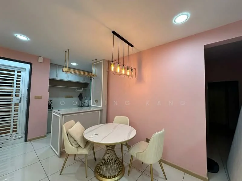 Dining features: round dining table with marble top, golden base for dining table, 4 upholstered dining chairs in cream, pendant light fixture with multiple bulbs, pink painted walls, white tiled flooring, recessed ceiling lights, open kitchen area visible in background; style: modern.