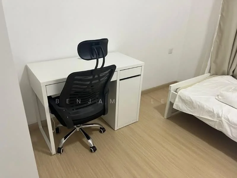 Room features: white walls, light wood flooring, single bed with white bedding, white desk, black office chair with wheels, small white cabinet, curtains, minimalist decor; style: modern.