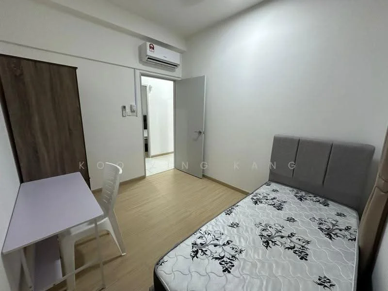 Bedroom features: single bed with upholstered headboard, mattress with floral pattern, wooden flooring, white painted walls, wall-mounted split AC, desk with white surface, plastic chair, door leading to hallway, light switch on wall, window with no visible treatment; style: modern.