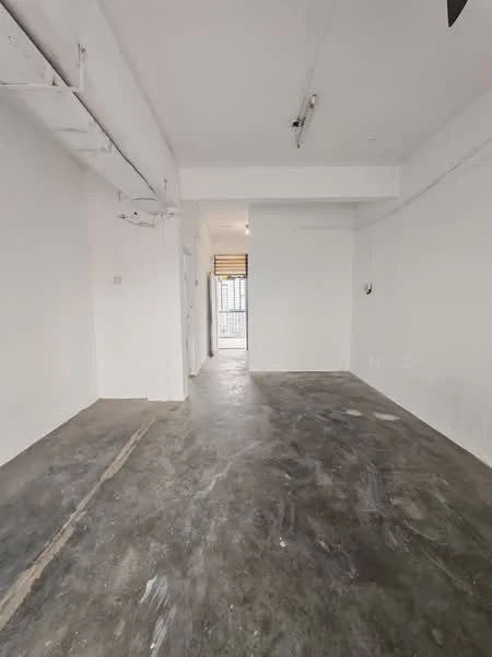 Room features: white painted walls, concrete flooring, exposed ceiling beams, large windows, doorway leading outside, neutral color scheme, minimalist design; style: minimalist.