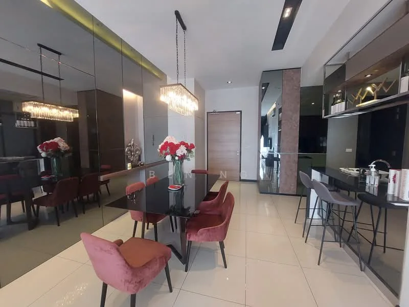 Dining features: black dining table, 4 upholstered dining chairs in burgundy, chandelier with crystal accents, mirrored wall, white tiled flooring, recessed ceiling lights, decorative wall art, vase with red flowers, open kitchen area visible, glass panel cabinetry, bar stools at kitchen counter; style: modern.