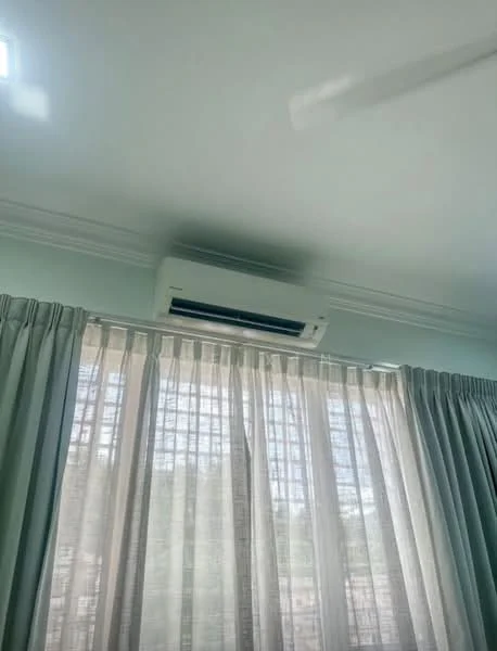 Room features: white painted walls, ceiling fan, floor-to-ceiling windows, sheer curtains, air conditioning unit.