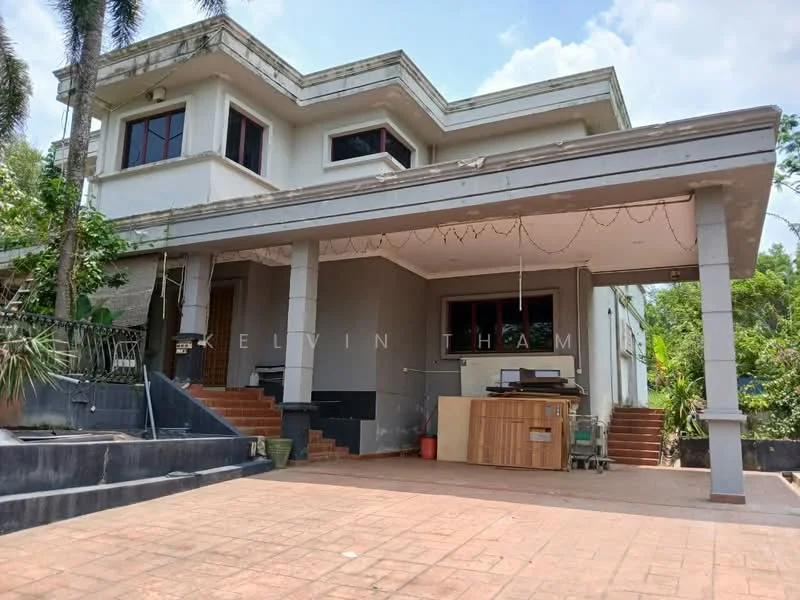 Exterior type: detached bungalow; features: two-storey building, white painted facade, flat roof, large porch area, staircase leading to entrance, balcony on upper floor, surrounded by greenery, paved driveway, outdoor lighting, large windows, wooden door at entrance; style: modern.