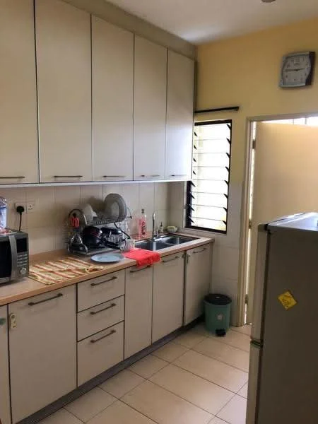 Kitchen features: light wood cabinetry, white tiled backsplash, laminate countertop, single-bowl stainless-steel sink, chrome pull-down faucet, built-in microwave, freestanding fridge, ceramic tile flooring, window with louvered shutters, wall clock, dish rack, kitchen towels; style: modern.