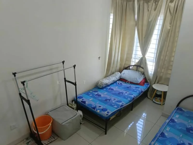 Bedroom features: two single beds with blue bedding, cream painted walls, glossy tile flooring, floor-to-ceiling windows with sheer curtains, hanging clothes rack, plastic bucket, small round table, light-colored curtains.