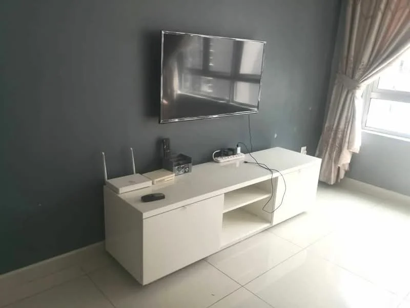 Living features: white TV console, wall-mounted flat-screen TV, cream-colored curtains, grey painted walls, glossy tile flooring, router on console, cable box on console, visible electrical outlets; style: modern.