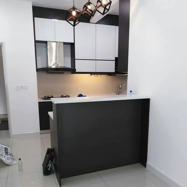 Kitchen features: black and white cabinetry, marble countertop, stainless-steel sink, chrome pull-down faucet, built-in gas hob, exhaust hood, pendant lighting, glossy tile backsplash, ceramic tile flooring, open layout with breakfast bar; style: modern.