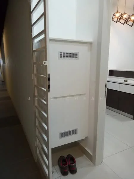 Room features: white wall, sliding door, built-in storage cabinet, ventilation grilles, grey floor tiles, decorative light fixture, shoes on the floor; style: modern.