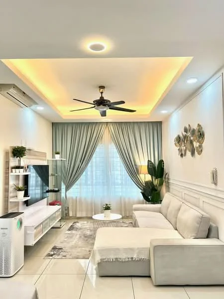 Living features: L-shape sectional sofa in light grey, round coffee table, TV console, wall-mounted TV, recessed downlights, 5-blade ceiling fan with light, floor-to-ceiling windows, sheer curtains, decorative wall art, cream painted walls with wainscoting, marble tile flooring, houseplants in ceramic pots; style: modern; view: city.