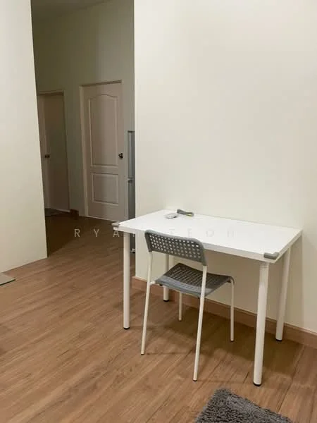 Room features: light wood flooring, white painted walls, simple white table, grey chair, doorway leading to another room, carpeted area rug; style: minimalist.