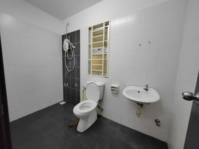 Bathroom features: white tiled walls, black tiled flooring, one-piece toilet, wall-mounted sink, shower head with hose, window for natural light, exposed plumbing, mirror above sink.