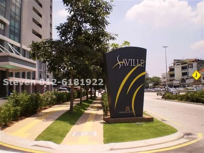 Exterior features: landscape garden, manicured lawn, paved walkway, signage with name 'Saville', trees lining the pathway, curved sign structure, surrounding urban context; style: modern.