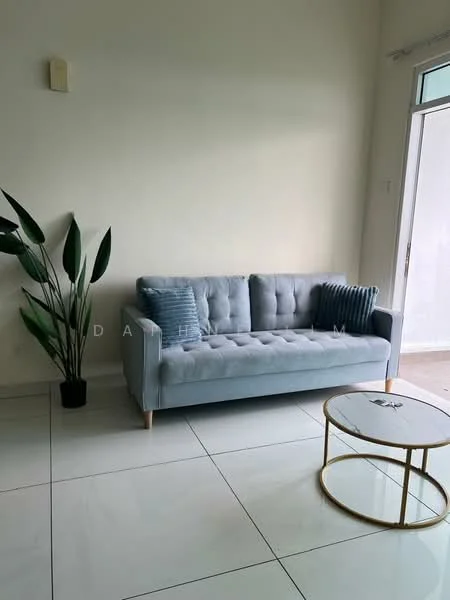 Living features: light grey fabric sofa with tufted design, blue decorative cushions, gold coffee table with round top, large potted plant, white painted walls, glossy white tile flooring, floor-to-ceiling windows, natural light from window; style: modern.
