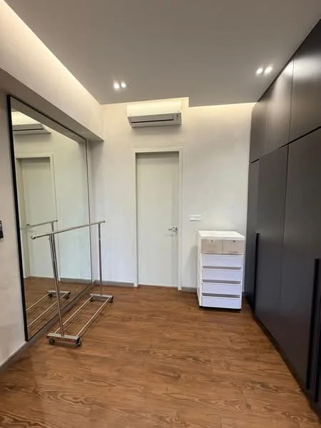 Room features: wooden flooring, white painted walls, recessed downlights, 1 wall-mounted split AC, full-length mirror, sliding door, built-in wardrobe with dark finish, clothing rack, white drawer unit; style: modern.