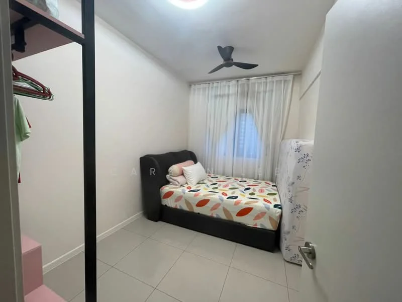 Bedroom features: single bed with colorful patterned bedding, white walls, ceiling fan, floor-to-ceiling window with sheer curtains, tiled flooring, built-in wardrobe with hanging space, decorative throw pillows, light fixture on ceiling; style: modern.