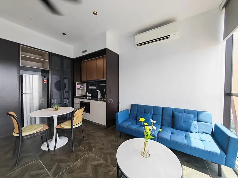 Living features: blue fabric sofa, round white dining table, 2 dining chairs with woven seats, white marble coffee table, kitchenette with dark cabinetry, stainless-steel fridge, built-in oven, black countertop, wall-mounted split AC, recessed downlights, grey tiled flooring, large window with city view; style: modern; view: city.
