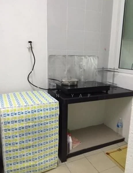 Room features: black countertop, stainless-steel stove, white tiled walls, cream floor tiles, black cabinet, plastic water bottle, cleaning supplies, electrical outlet.