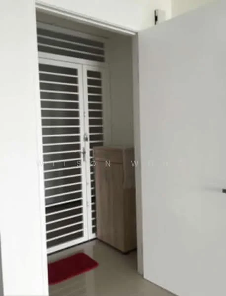 Room features: white walls, sliding glass door with horizontal slats, light-colored wooden cabinet, red doormat, glossy tile flooring, white door, door handle; style: modern.