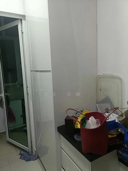 Room features: white cabinetry, glass door, tile flooring, countertop, various storage boxes, plastic containers, red basket, cluttered workspace.