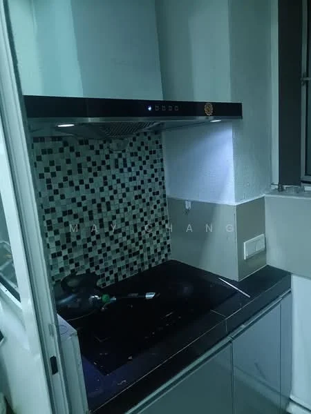 Kitchen features: black kitchen countertop, stainless-steel sink, chrome pull-down faucet, black range hood, mosaic tile backsplash, built-in cabinets, under-cabinet lighting, wall-mounted electrical outlet; style: modern.