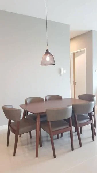 Dining features: round dining table, 6-seater dining table, wooden table with tapered legs, upholstered dining chairs in grey, pendant lamp with glass shade, light grey painted walls, neutral flooring, minimalist decor; style: modern.