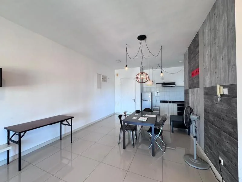 Living features: white painted walls, grey accent wall, glossy tile flooring, dining table with four chairs, black metal pendant light, refrigerator, built-in kitchen cabinetry, kitchen countertop, wall-mounted TV, ceiling fan; style: modern.