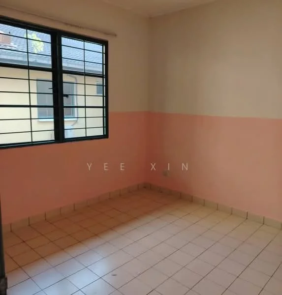 Room features: light pink painted walls, cream painted walls, tile flooring, single window with black metal grille, neutral ceiling, no visible furniture, empty space.