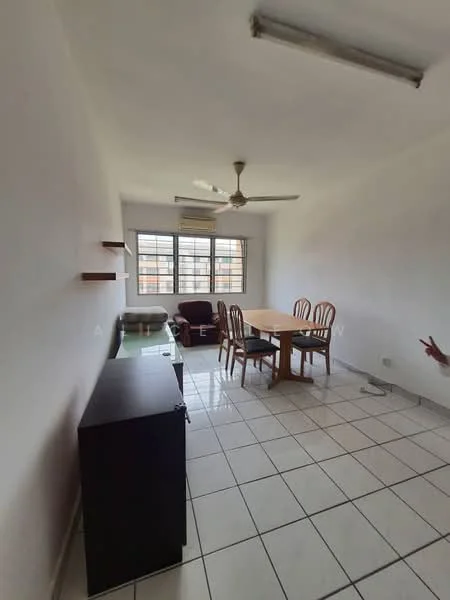 Living features: white painted walls, tile flooring, 5-blade ceiling fan, dining table with 4 chairs, brown fabric sofa, black cabinet, large windows with grid pattern, shelves on wall.
